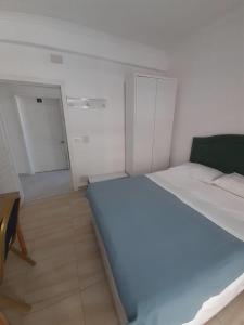 Postel nebo postele na pokoji v ubytování Villa-Hotel Ludianna