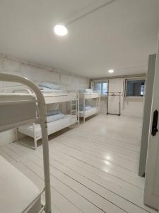 Ένα ή περισσότερα κρεβάτια σε δωμάτιο στο O2 Hostel