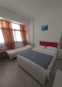 Postel nebo postele na pokoji v ubytování Villa-Hotel Ludianna