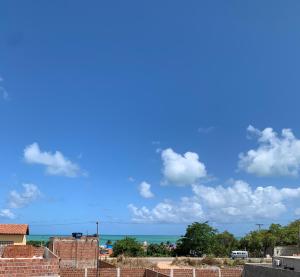 a view of the ocean from a building at Casa na Ilha de Itamaraca in Vila Velha