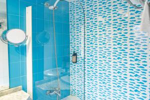 Ένα μπάνιο στο Hotel Faranda Pathos Gijón, Ascend Hotel Collection