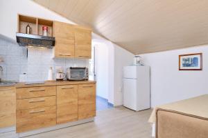 Kuchyň nebo kuchyňský kout v ubytování Apartments Nada