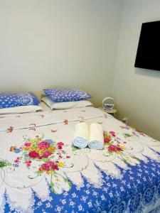 Un pat sau paturi într-o cameră la Casa de praia Búzios