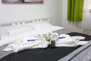 Ένα ή περισσότερα κρεβάτια σε δωμάτιο στο Ivan's guesthouse