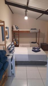 Postel nebo postele na pokoji v ubytování Pousada Encantos de Socorro