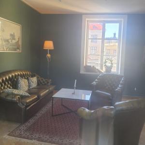 Posezení v ubytování mellanbrons B&B