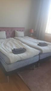 Postel nebo postele na pokoji v ubytování mellanbrons B&B