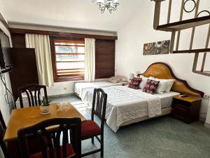 Llit o llits en una habitació de Hotel Hassler