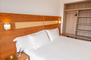 Postel nebo postele na pokoji v ubytování Hotel Faranda Los Tilos, Ascend Hotel Collection + 37 fotografií