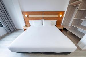 Postel nebo postele na pokoji v ubytování Hotel Faranda Los Tilos, Ascend Hotel Collection