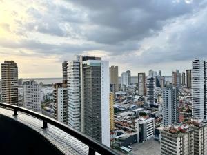 a view of a city with tall buildings at Premier Apartment - Hotel Mercure Belém Boulevard in Belém