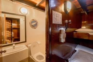 a bathroom with a toilet and a sink at Aisha Safari in Hulhumale +16 photos