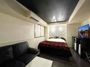 TV a/nebo společenská místnost v ubytování HOTEL 31 + 32 fotografií