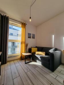 Posedenie v ubytovaní Old Town Yellow Apartment