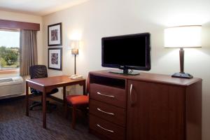 A television and/or entertainment centre at AmericInn by Wyndham Blackduck