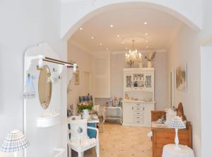 a bathroom with a sink and a mirror at Haus Midsommer in Timmendorfer Strand