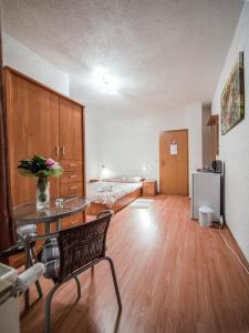 Posezení v ubytování Apartment and Rooms Aračić
