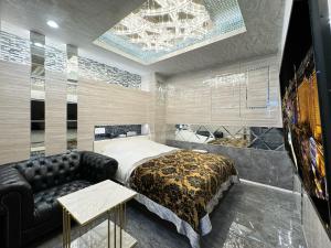Postel nebo postele na pokoji v ubytování Hotel Century