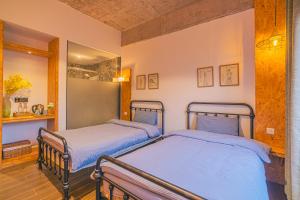 Cama o camas de una habitación en Danxia Mountain Wuyou Tongjinzhai