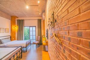 Cama o camas de una habitación en Danxia Mountain Wuyou Tongjinzhai