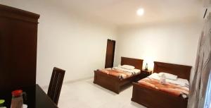 Кровать или кровати в номере Hotel Green Prundi