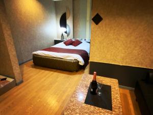 Ένα ή περισσότερα κρεβάτια σε δωμάτιο στο HOTEL K's GOMANGOKU adult only