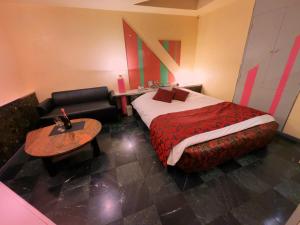 Ένα ή περισσότερα κρεβάτια σε δωμάτιο στο HOTEL K's GOMANGOKU adult only