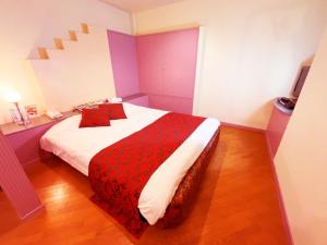 Ένα ή περισσότερα κρεβάτια σε δωμάτιο στο HOTEL K's GOMANGOKU adult only