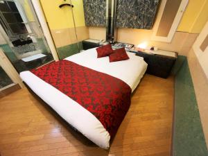 Ένα ή περισσότερα κρεβάτια σε δωμάτιο στο HOTEL K's GOMANGOKU adult only