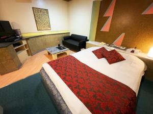 Ένα ή περισσότερα κρεβάτια σε δωμάτιο στο HOTEL K's GOMANGOKU adult only