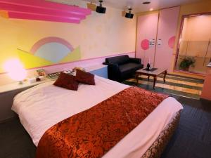 Ένα ή περισσότερα κρεβάτια σε δωμάτιο στο HOTEL K's GOMANGOKU adult only