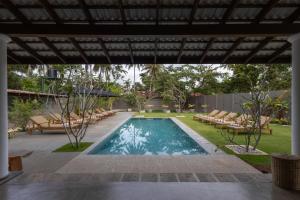 Kolam renang di atau dekat dengan Mudliyar House