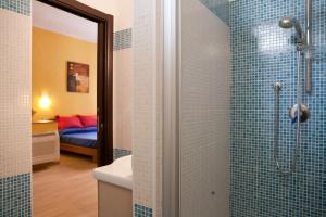 A bed or beds in a room at Abba De Mar