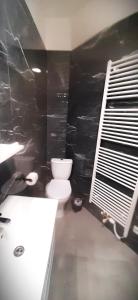 Kúpeľňa v ubytovaní Arbes apartman