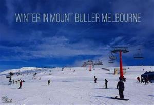 a group of people on a snow covered ski slope at Mt Buller 3BR Family Chalet-Spacious with Cozy Touches in Mount Buller +40 photos