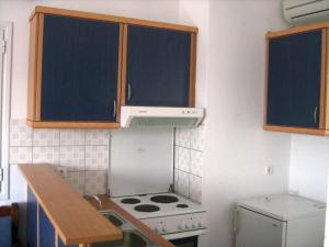 Kuchyňa alebo kuchynka v ubytovaní Palmos Self-Catering Apartment with sea view