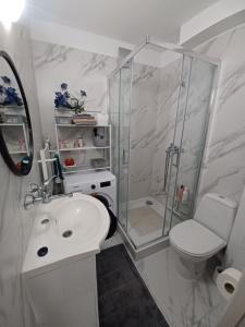Kúpeľňa v ubytovaní Apartament LORD