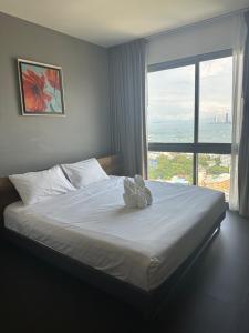 Krevet ili kreveti u jedinici u okviru objekta unixx seaview hotel