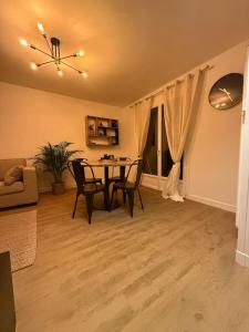 Χώρος καθιστικού στο Appartement spacieux