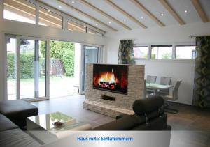 A seating area at Urlaubsapartment am Silbersee Még 16 kép