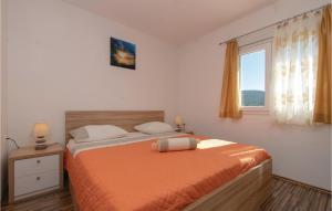 Postel nebo postele na pokoji v ubytování Holiday Home Vela Luka 06