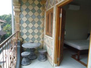 Koupelna v ubytování The Reinhold Guesthouse Bali