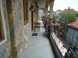 Balkón nebo terasa v ubytování The Reinhold Guesthouse Bali