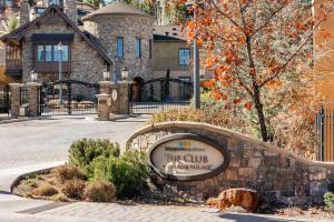 a sign in front of a house with a building at Bluegreen Vacations Big Bear Village, an Ascend Collection Resort in Big Bear Lake +83 photos