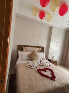 Ένα ή περισσότερα κρεβάτια σε δωμάτιο στο Appartement jasmine