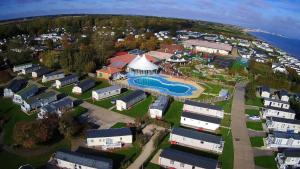 an aerial view of a resort with a swimming pool at Luxury Lodge With Stunning Full Sea Views At Hopton Ref 80010W in Great Yarmouth