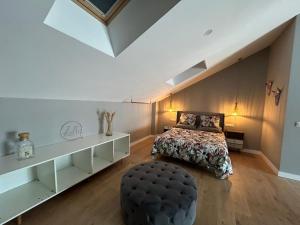 a bedroom with a bed and a large window at Gran Reserva Cuzcurrita in Cuzcurrita-Río Tirón +24 photos