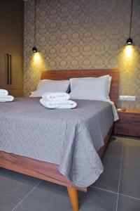 Voodi või voodid majutusasutuse Nychome toas +28 fotot