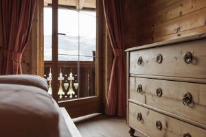 Voodi või voodid majutusasutuse Alpen-Chalet-Pankraz toas