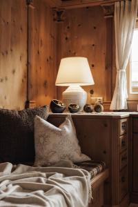 Voodi või voodid majutusasutuse Alpen-Chalet-Pankraz toas